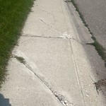 Sidewalk or Curb - Repair at 828 Hunterston Cr NW