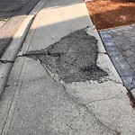 Sidewalk or Curb - Repair at 210 12 A St NE
