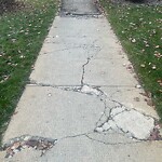 Sidewalk or Curb - Repair at 309 5 Av NE