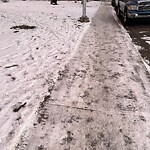 Snow On City-maintained Pathway or Sidewalk at 1702 12 Av SW