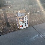 Debris on Street, Sidewalk, Boulevard at 517 13 Av SW