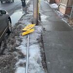 Sign on Street, Lane, Sidewalk - Repair or Replace at 609 1 Av NE