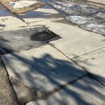 Sidewalk or Curb - Repair at 59 Patterson Bv SW