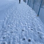 Snow On City-maintained Pathway or Sidewalk at 201 Skyview Ranch Rd NE