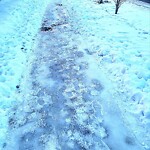 Snow On City-maintained Pathway or Sidewalk at 320 Silverado Bv SW