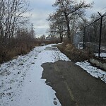 Snow On City-maintained Pathway or Sidewalk at 1601 Memorial Dr NE