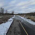 Snow On City-maintained Pathway or Sidewalk at 1638 Centre Av NE