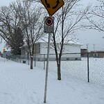Sign on Street, Lane, Sidewalk - Repair or Replace at 239 18 Av NW