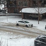 Snow On City Road at 1001 14 Av SW