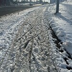 Snow On City-maintained Pathway or Sidewalk at 2480 Bow Tr SW