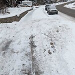 Snow On City-maintained Pathway or Sidewalk at 103 Silver Crest Cr NW