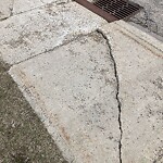 Sidewalk or Curb - Repair at 45 Saddlemead Wy NE