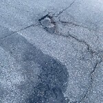 Pothole Repair at 159 Taravista Dr NE