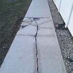 Sidewalk or Curb - Repair at 863 Saddletowne Ci NE