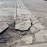 Sidewalk or Curb - Repair at 5450 61 Av SE