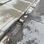 Sidewalk or Curb - Repair at 606 4 Av NE