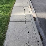 Sidewalk or Curb - Repair at 2212 65 St NE