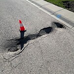 On-Street Bike Lane - Repair at 32 Discovery Ridge Co SW