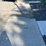Sidewalk or Curb - Repair at 628 56 Av SW