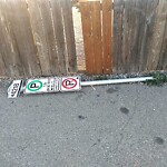 Sign on Street, Lane, Sidewalk - Repair or Replace at 221 15 Av SE