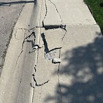 Sidewalk or Curb - Repair at 127 Evansridge Vw NW