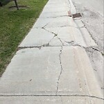 Sidewalk or Curb - Repair at 679 Tuscany Springs Bv NW