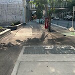 Sidewalk or Curb - Repair at 585 8 Av SW
