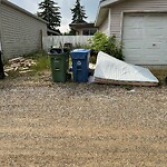 Debris on Backlane at 6008 8 Av SE