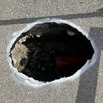 Pothole Repair at 864 Bridge Cr NE