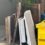 Debris on Backlane at 707 3 Av NW