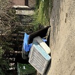 Debris on Backlane at 1820 17 Ave NW Northwest Calgary