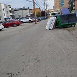 Debris on Backlane at 113 23 Av SW