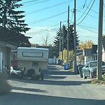 Debris on Backlane at 3139 Rae Cr SE