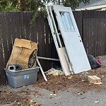 Debris on Backlane at 156 Templegreen Dr NE