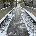 Snow On City Road at 150 Panatella Ci NW