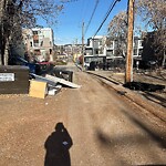 Debris on Backlane at 2108 17 St SW