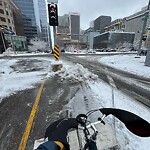 Snow On City Road at 701 3 Av SW