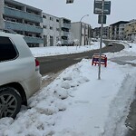 Snow On City Road at 236 4 St NE