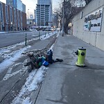 Debris on Street, Sidewalk, Boulevard at 331 9 Av SE