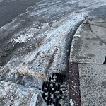 Catch Basin / Storm Drain Concerns at 1412 4 St NE