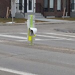 Sign on Street, Lane, Sidewalk - Repair or Replace at 717 8 Av NE