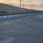 Debris on Street, Sidewalk, Boulevard at 2456 96 Av SE