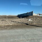 Debris on Street, Sidewalk, Boulevard at 14010 52 St NE