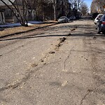 Debris on Street, Sidewalk, Boulevard at 321 17 Av NW