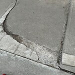 Sidewalk or Curb - Repair at 1010 8 St SW Beltline