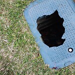 Manhole Damage at 233 Copperfield Mr SE